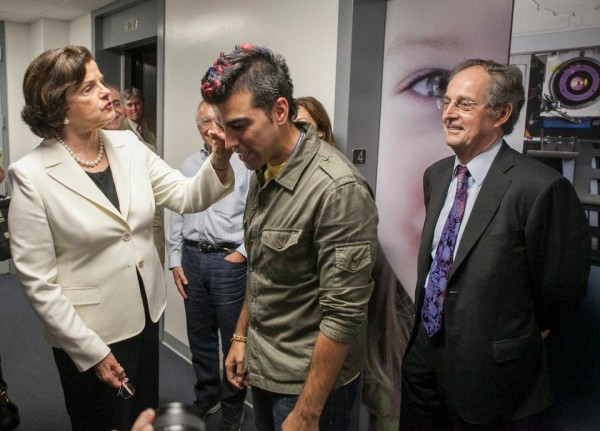 Dianne Feinstein and Bobak Ferdowsi (a.k.a. “NASA mohawk guy”), the activity lead for NASA’s Curiosity mission. Image credit: AP Photo/Damian Dovarganes.