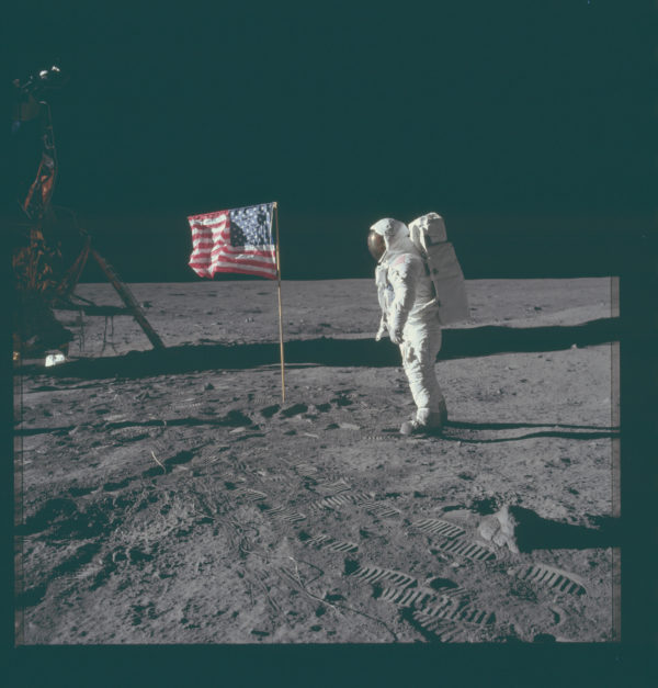 Buzz Aldrin having just planted the first American flag on the surface of a world other than our own. Image credit: NASA/Apollo 11.