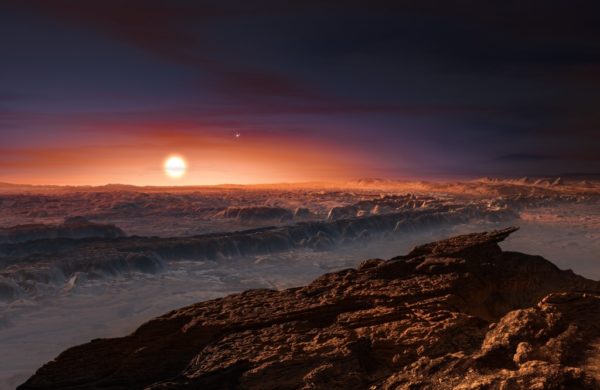An artist’s rendition of Proxima Centauri as seen from the “ring” portion of the world, Proxima b. Winds would appear to originate from the direction of the Sun, always, which would never rise or set. Alpha Centauri A and B (shown) would be visible during the day. Image credit: ESO/M. Kornmesser.