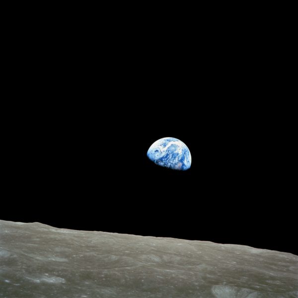 The first view with human eyes of the Earth rising over the limb of the Moon. Note how bright the Earth appears in comparison to the Moon. Image credit: NASA / Apollo 8.