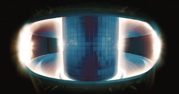 The plasma in the center of this fusion reactor is so hot it doesn't emit light; it's only the cooler plasma located at the walls that can be seen. Hints of magnetic interplay between the hot and cold plasmas can be seen. Image credit: National Fusion Research Institute, Korea.