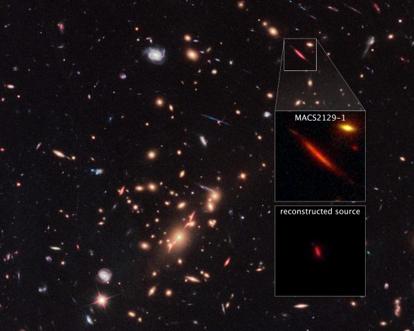 From the distant Universe, light has traveled for some 10.7 billion years from distant galaxy MACSJ2129-1, lensed, distorted and magnified by the foreground clusters imaged here. Image credit: NASA, ESA, and S. Toft (University of Copenhagen) Acknowledgment: NASA, ESA, M. Postman (STScI), and the CLASH team.