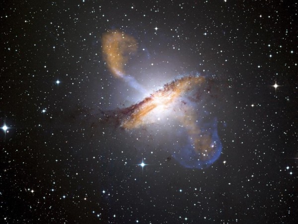 The galaxy Centaurus A with its active, central black hole. Image credit: X-ray: NASA/CXC/CfA/R.Kraft et al.; Submillimeter: MPIfR/ESO/APEX/A.Weiss et al.; Optical: ESO/WFI.