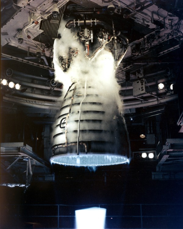 Image credit: NASA, 1981. A remote camera captures a close-up view of a Space Shuttle Main Engine during a test firing at the John C. Stennis Space Center in Hancock County, Mississippi.