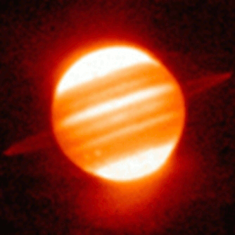 Jupiter and its rings, bands and other heat-sensitive features in the infrared. Image credit: user Trocche100 at the Italian Wikipedia.