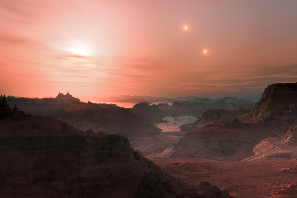 Artist’s impression of a sunset from the world Gliese 667 Cc, in a trinary star system. Image credit: ESO/L. Calçada.