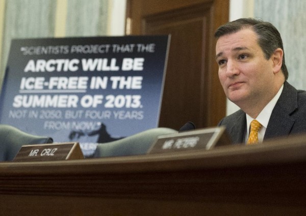 Ted Cruz, with a loaded statement from a questionable science news source, during a hearing on climate change on December 8, 2015. Image credit: SAUL LOEB/AFP/Getty Images.