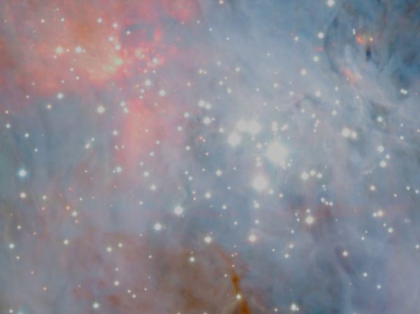 An infrared view of the brightest part of the Orion Nebula. Image credit: ESO/H. Drass et al., color-corrected by E. Siegel.