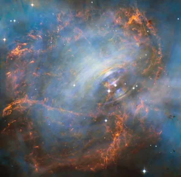 The highest-resolution image, taken in time-lapse in different colors, of the central region of the Crab Nebula. Image credit: NASA, ESA.