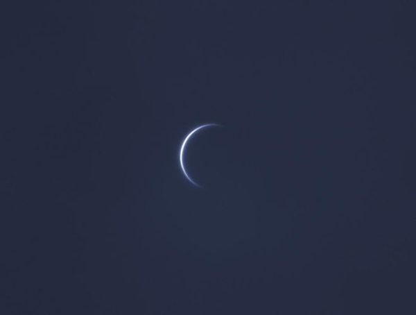 In its crescent phase as viewed from Earth, Venus can give us atmospheric data. Image credit: Chris Shur of http://www.schursastrophotography.com/.