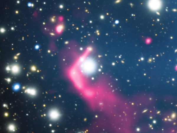 The most energetic shock can be clearly seen around one of the galaxies, well-offset from the X-rays' peak intensity. Image credit: X-ray: NASA/CXC/SAO/R. van Weeren et al; Optical: NAOJ/Subaru; Radio: NCRA/TIFR/GMRT.