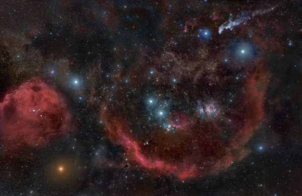 The constellation of Orion, along with the great molecular cloud complex and including its brightest stars. Betelgeuse, the nearby, bright red supergiant (and supernova candidate), is at the lower left. Image credit: Rogelio Bernal Andreo.